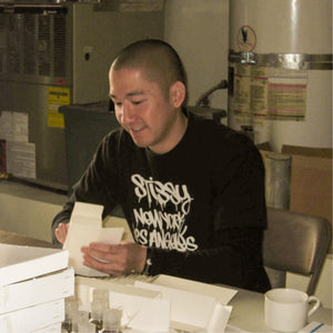 a young Jason, founder of Jason Markk starting the business in his garage