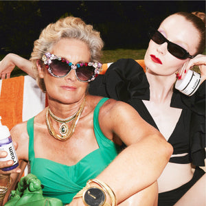 Image of two women with Jason Markk products from the launch of our Leather Care program