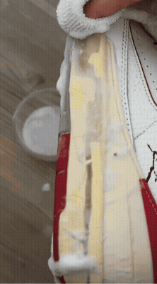 GIF of someone cleaning a pair of Jordans with Jason Markk products.