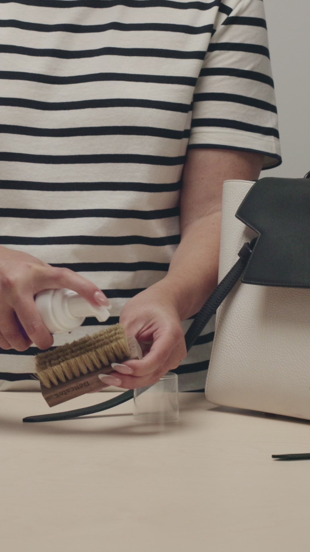 APPLY JASON MARKK FOAM CLEANER ON TO DELICATES BRUSH