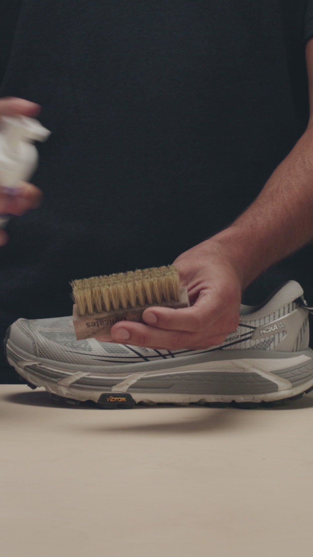APPLYING JASON MARKK READY-TO-USE FOAM CLEANER ON A DELICATES CLEANING BRUSH